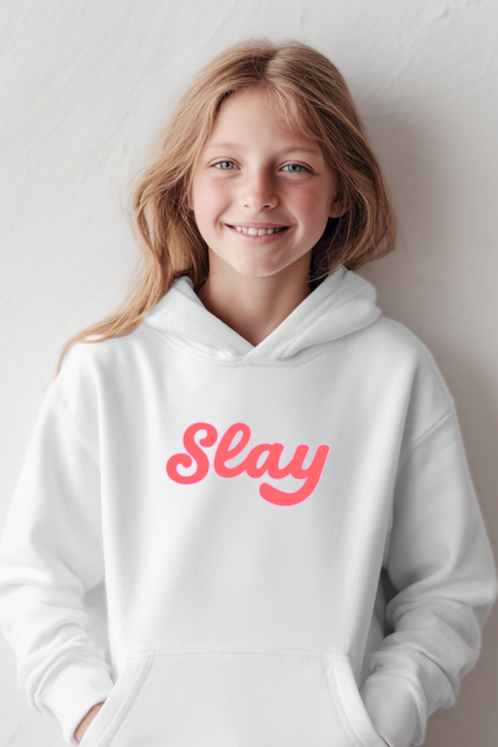 Level up her style with the cozy Slay Hoodie. This white hoodie with bold pink lettering is soft, comfy, and available in youth to adult 5XL. Perfect for birthdays, holidays, or matching family hoodies — a fun gift for girls and teens who love to slay every day. #SlayHoodie #GirlsHoodie #TeenStyle #MatchingOutfits #GiftIdeas