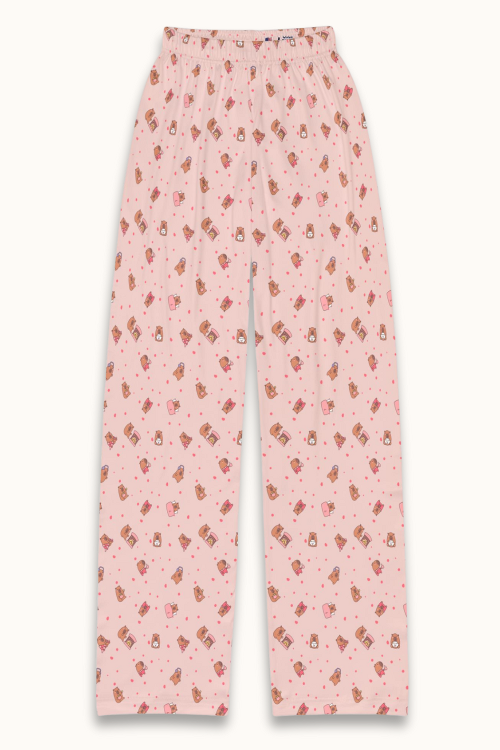 Adorable capybara print lounge pants in soft Shell Pink, featuring playful capybaras and tiny plushie icons scattered across cozy brushed polyester fabric. A cute, unisex pajama bottom perfect for kids, tweens, and teens who love fun, pastel sleepwear. Ideal for gifting, sleepovers, and cozy nights in.