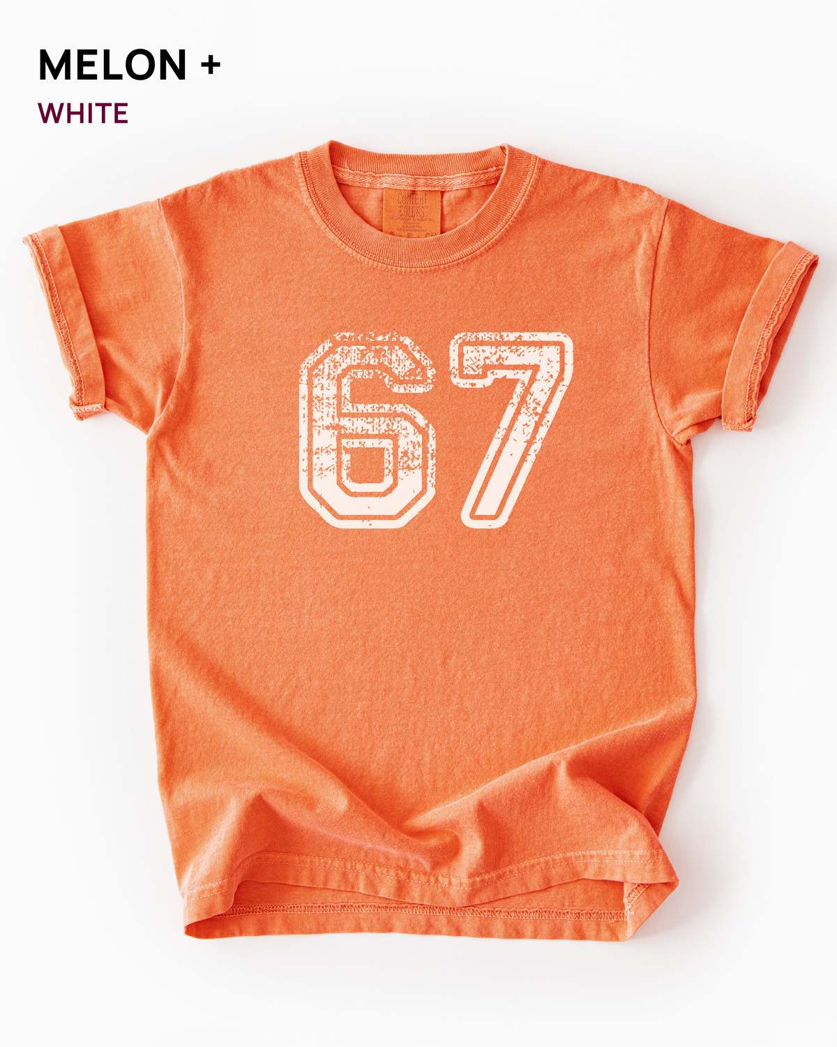Custom varsity number tee in Melon orange with a white distressed varsity number